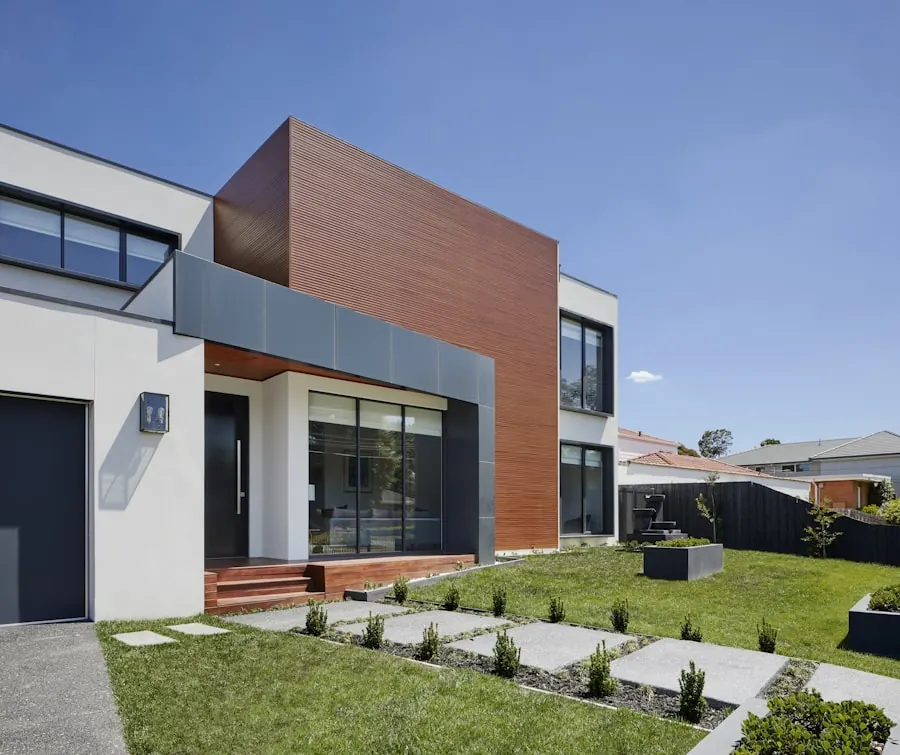 Green plotted development with tree-lined internal roads